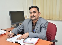 Dr. S. Srinivasan 