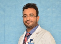 Dr. Gautham G